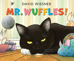 Mr. Wuffles by David Wiesner. Just go buy this book and read it to your cat, okay?